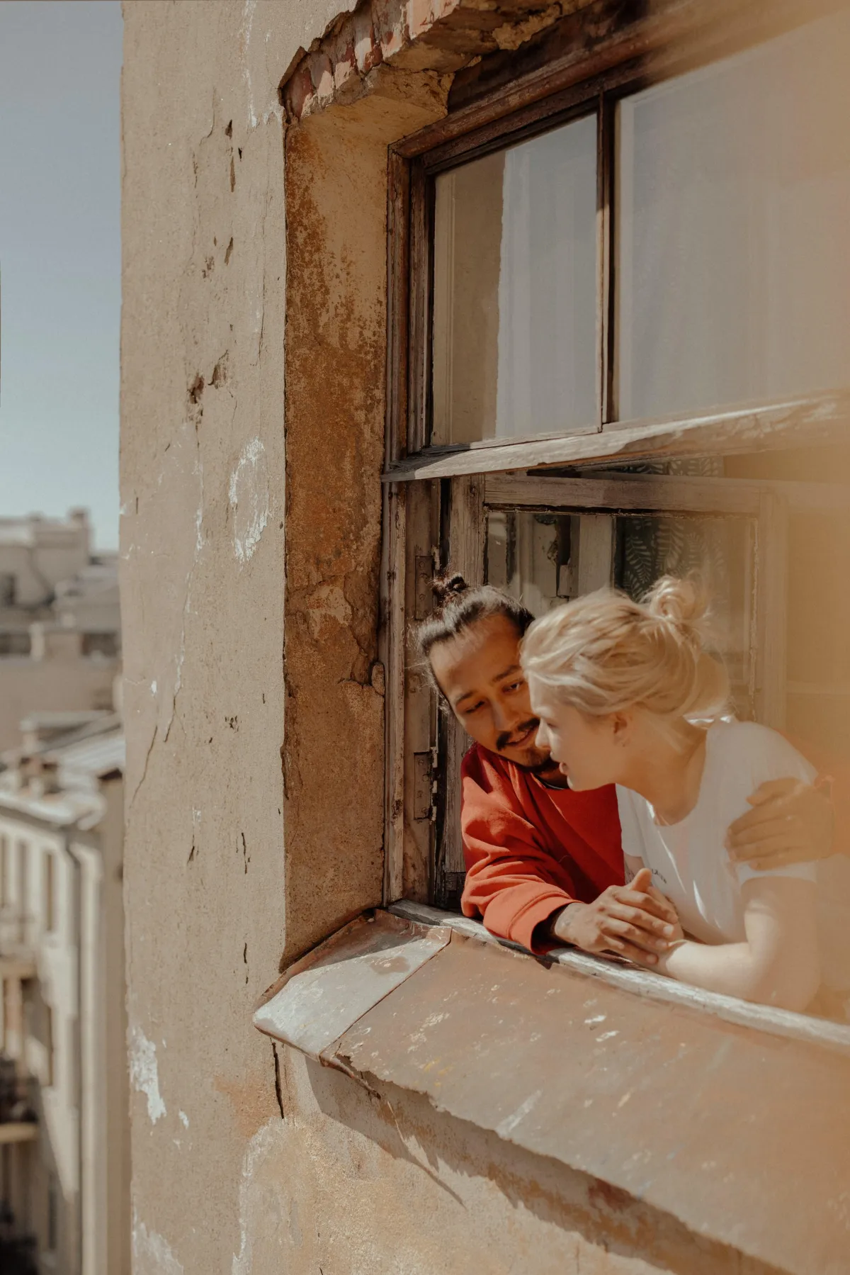 happy couple with moving boxes
