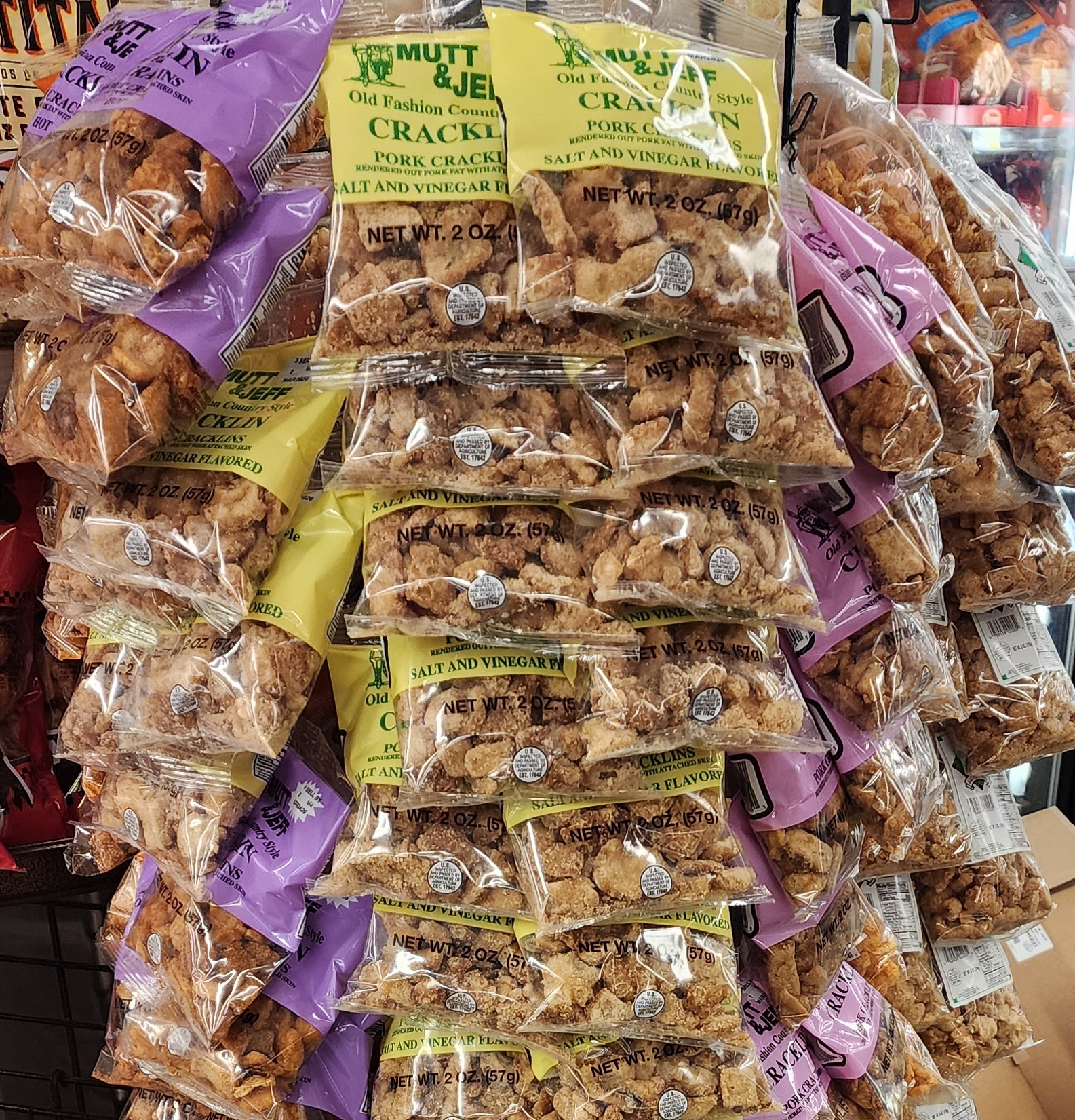Display of Mutt and Jeff Porkskins bags in a retail store