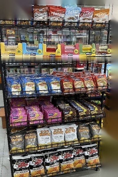 Retail shelves stocked with Triple S Snacks partner products