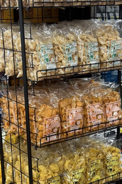 Display of Mutt and Jeff Porkskins bags in a retail store