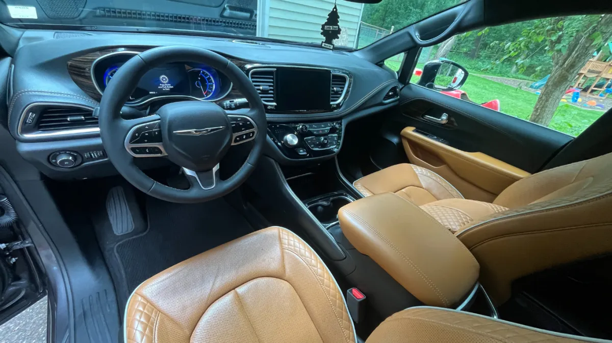 Luxury car interior after professional auto detailing service in Fall Creek WI with spotless finish