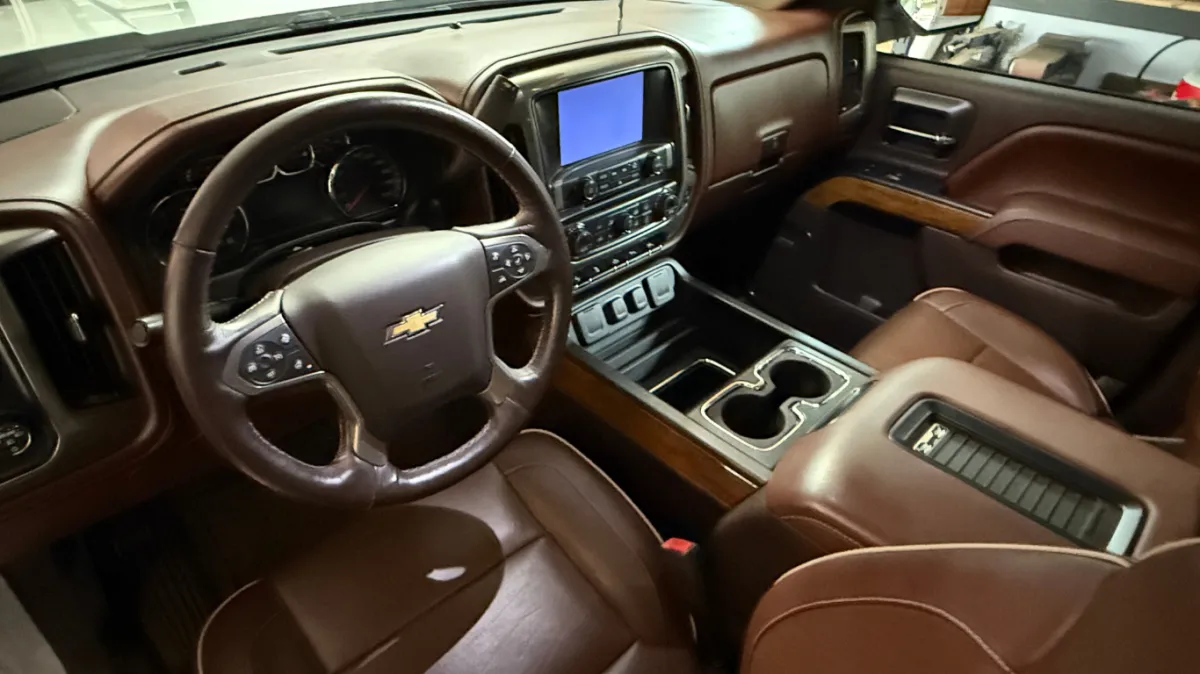 Chevy vehicle brown interior after detailing and leather conditioning service in Eau Claire WI