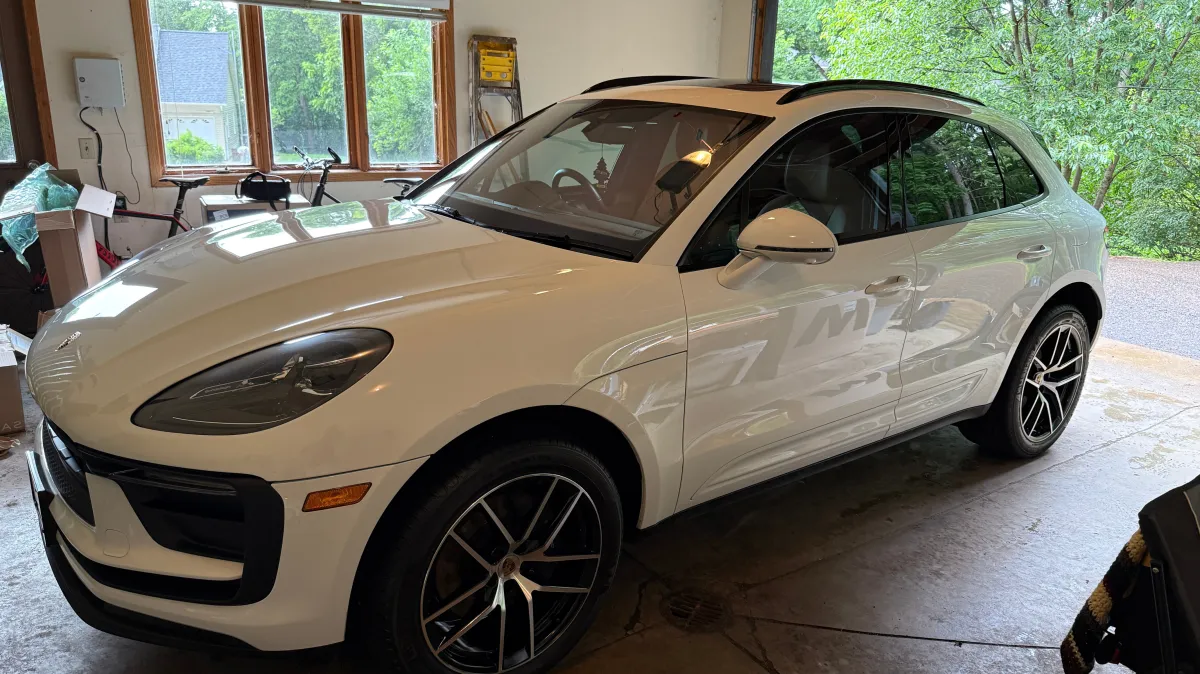 White Porsche Macan SUV featuring ceramic coating service in Eau Claire WI to protect paint and maintain showroom shine