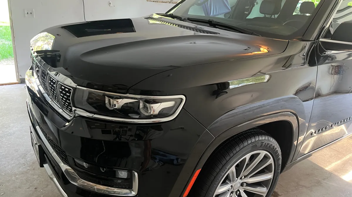 Black Jeep Grand Cherokee after ceramic coating treatment in Chippewa Falls WI for UV protection and sleek glossy appearance