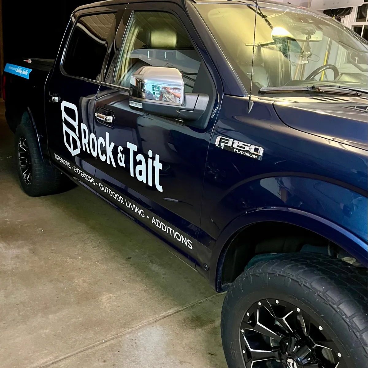 Ford F-150 work truck exterior cleaned and polished during commercial auto detailing service for Rock & Tait company In Chippewa Falls