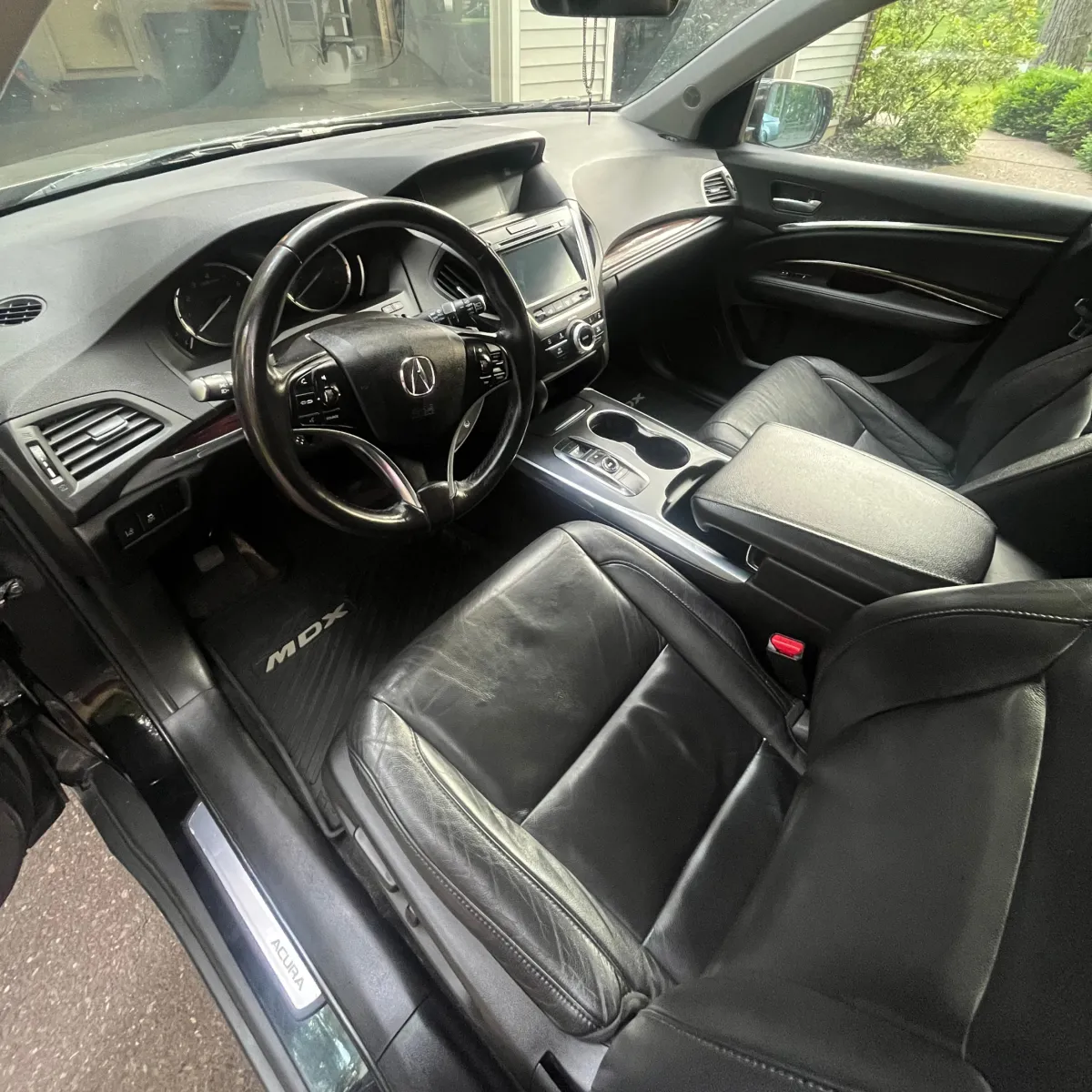 Acura MDX black interior after deluxe interior detailing and protection service in Eau Claire WI