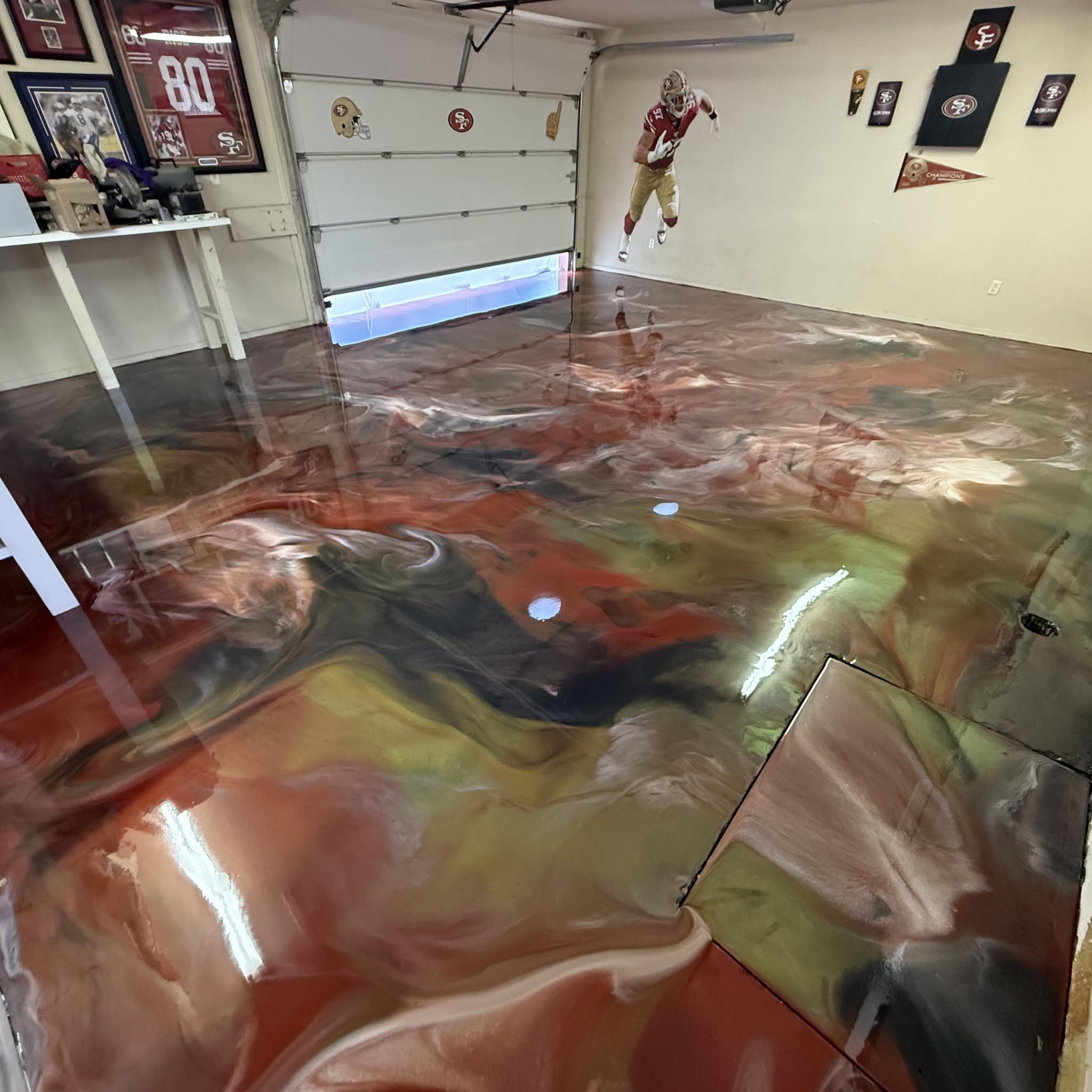 red and gold metallic epoxy garage floor in Midland, TX