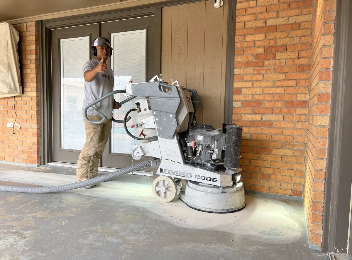 Home Run Concrete Coatings crew prepping a floor in Midland, TX