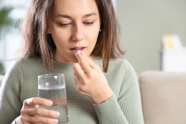 woman taking abortion pill instead of scheduling appointment at pregnancy center