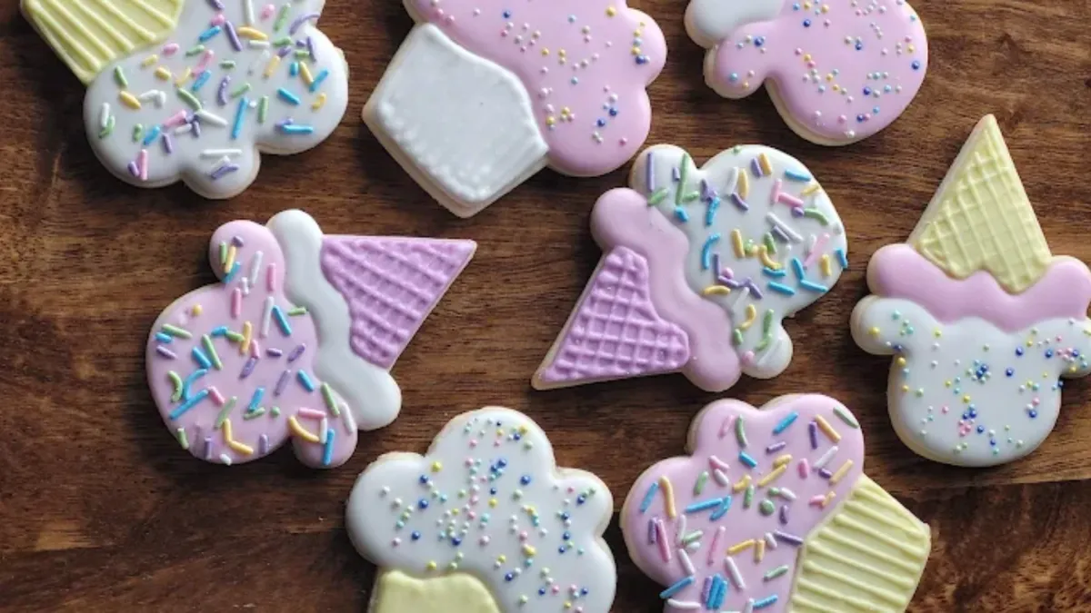 Custom cookies shaped as ice cream cones.