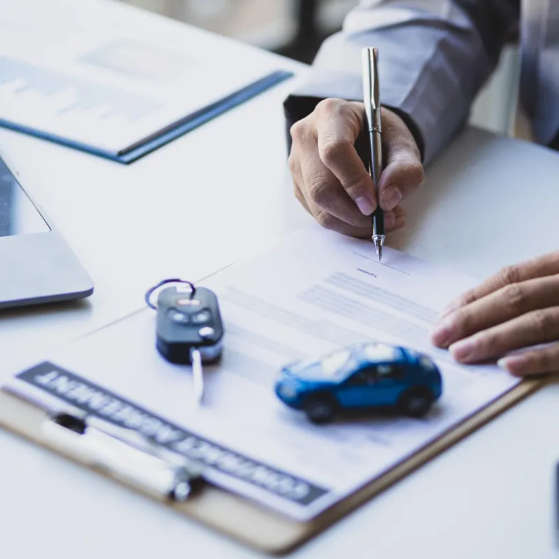 Local agent helping a driver compare auto insurance options in San Bernardino, CA