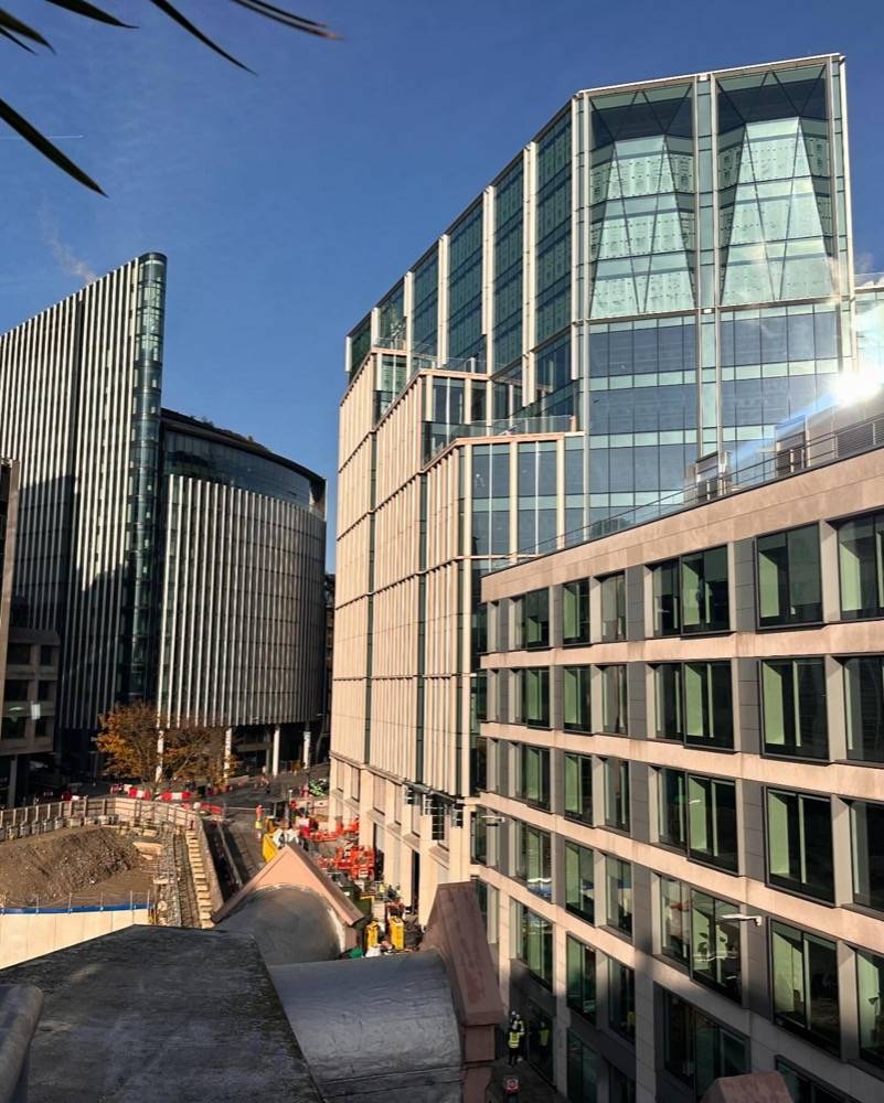 Drainage survey equipment with Canary Wharf office towers in the background