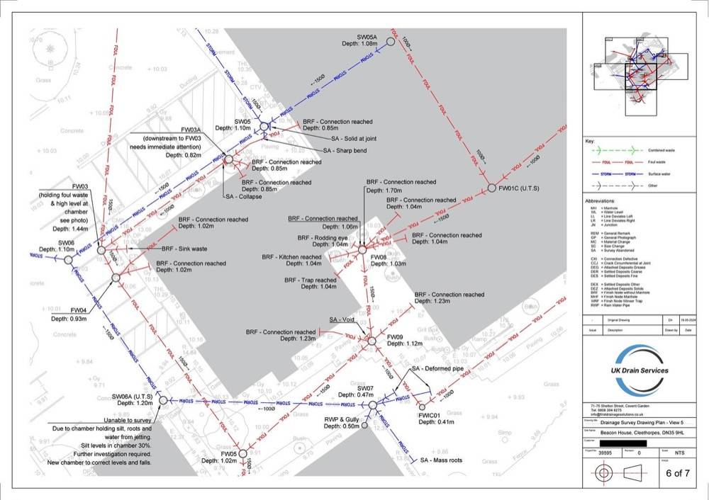 Professional drainage site plan showing pipe routes and manhole positions