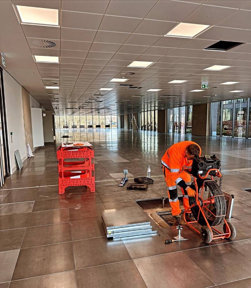 CCTV drain survey being conducted inside a large commercial building