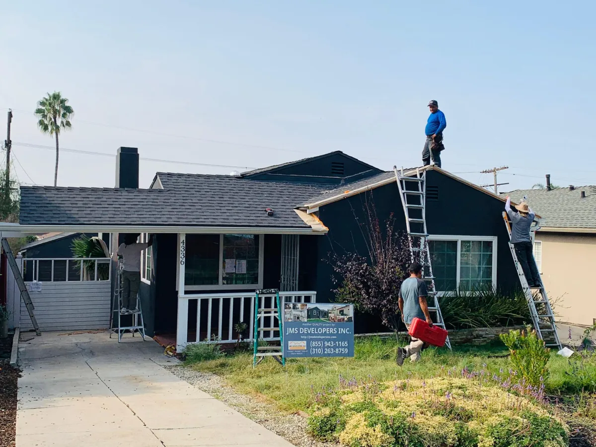JMS construction team doing roofing