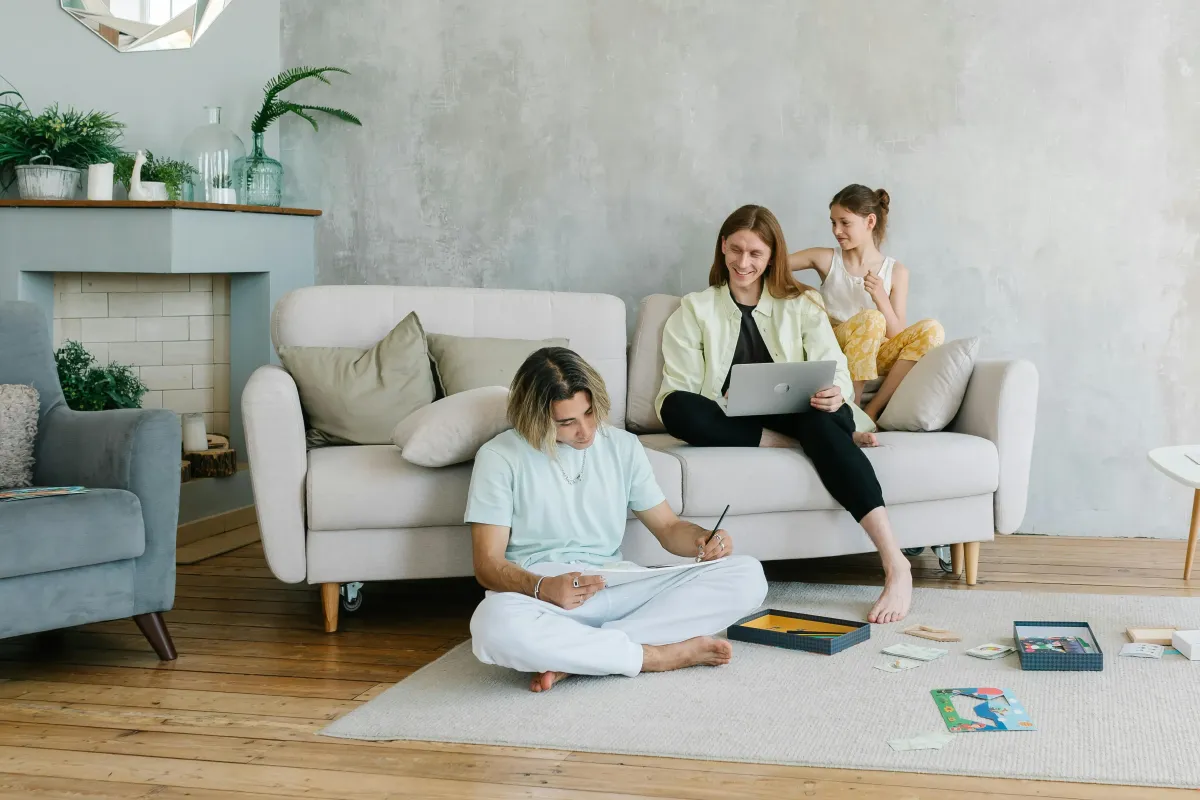 Three-generation family spending time together in a bright Los Angeles living room