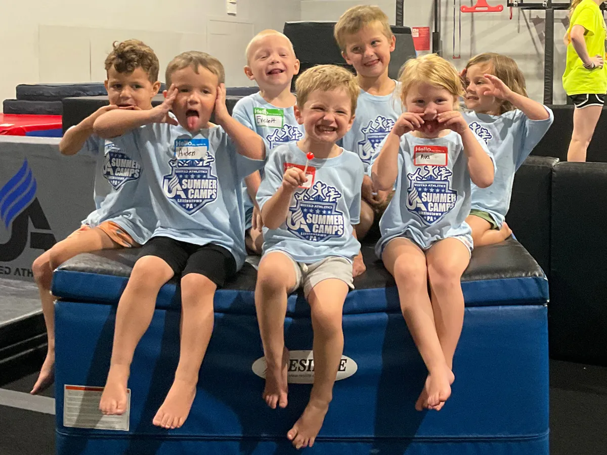 young campers making silly faces