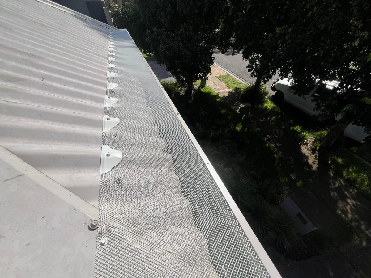 Premium aluminium mesh gutter guard professionally installed on Colorbond roof Australia 15 year warranty