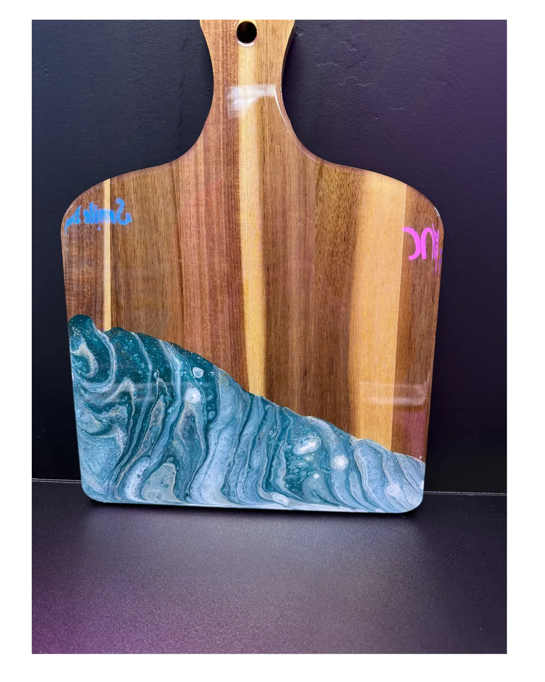 a group of palm trees with a sky background