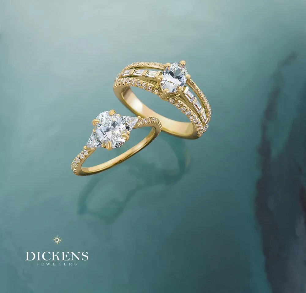 a silver bracelet with a heart charm