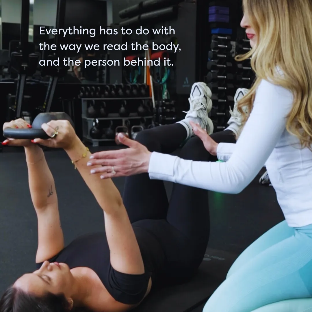 Men exercising outdoors with an ab roller wheel.