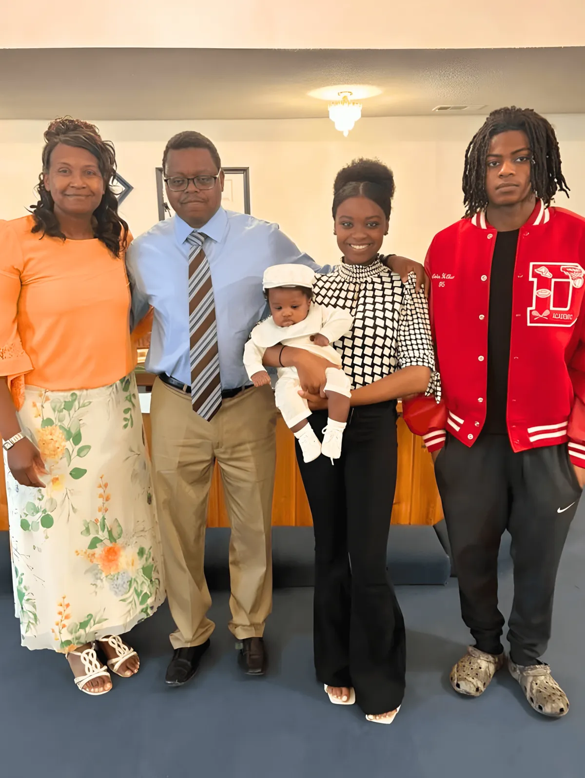 Tremayne Hilburn with family representing community focused lawn care in Eastman GA