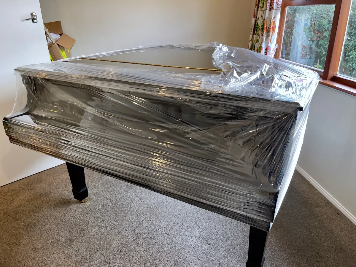 Completely wrapped piano ready to be oved