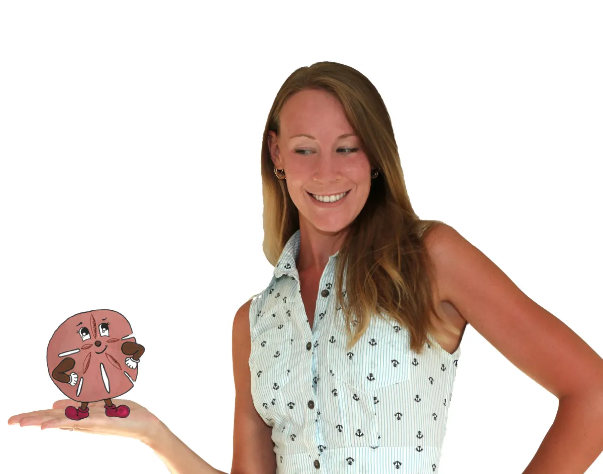 Nina Leipold holding Sammy the Sand Dollar