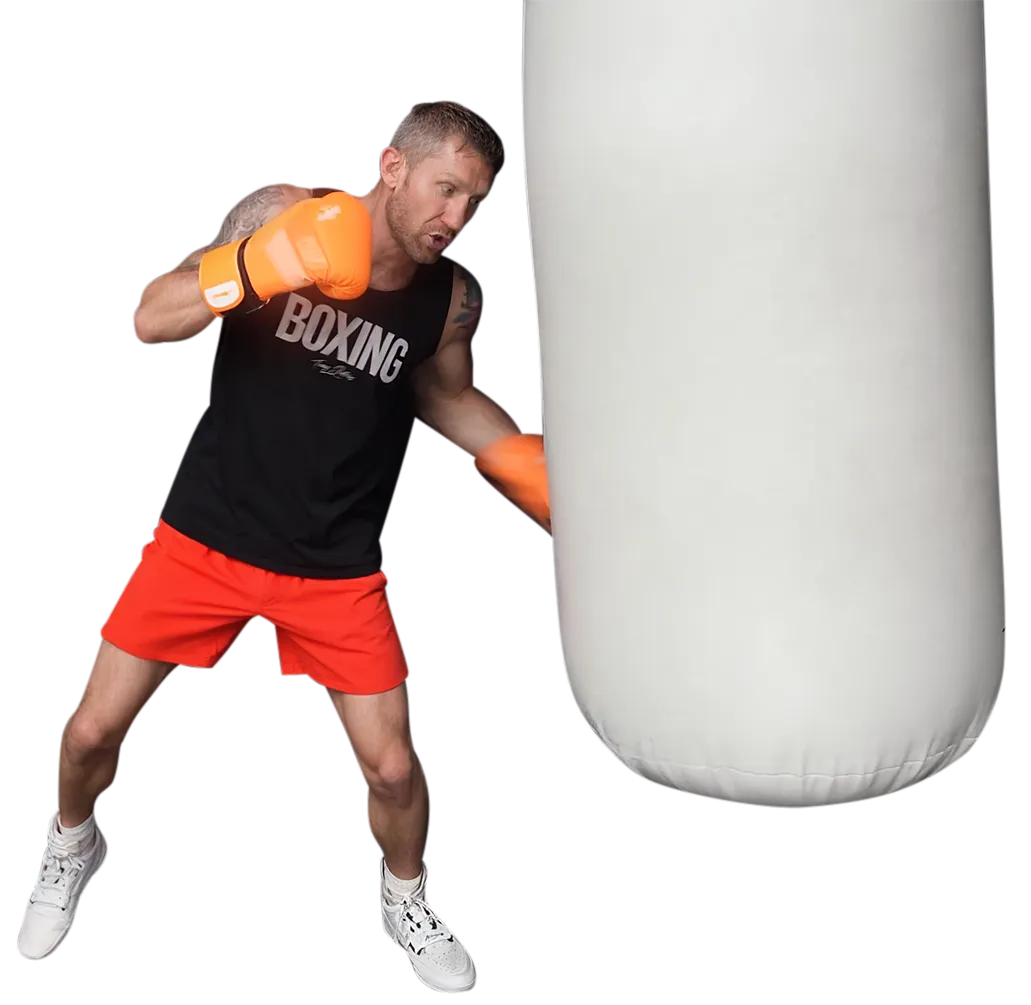Boxer training with heavy bag