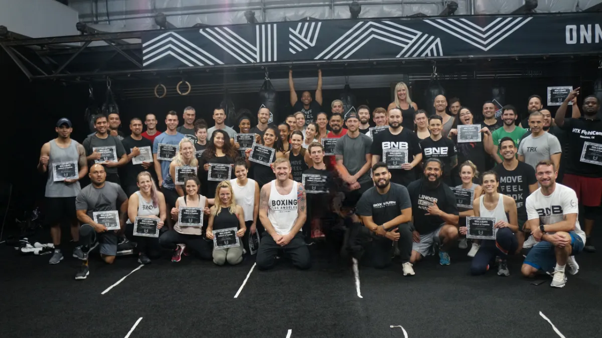 Group of young personal trainers attending an in person boxing for fitness certification course in Melbourne, Australia taught by Tony Jeffries.