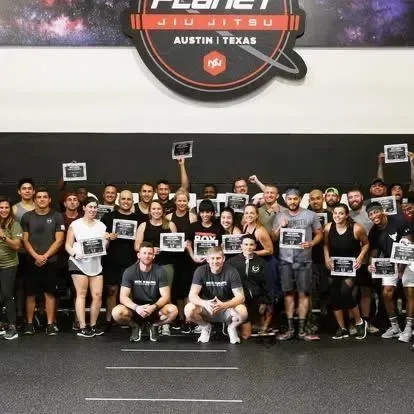 Group of young personal trainers attending an in person boxing for fitness certification course taught by Tony Jeffries.