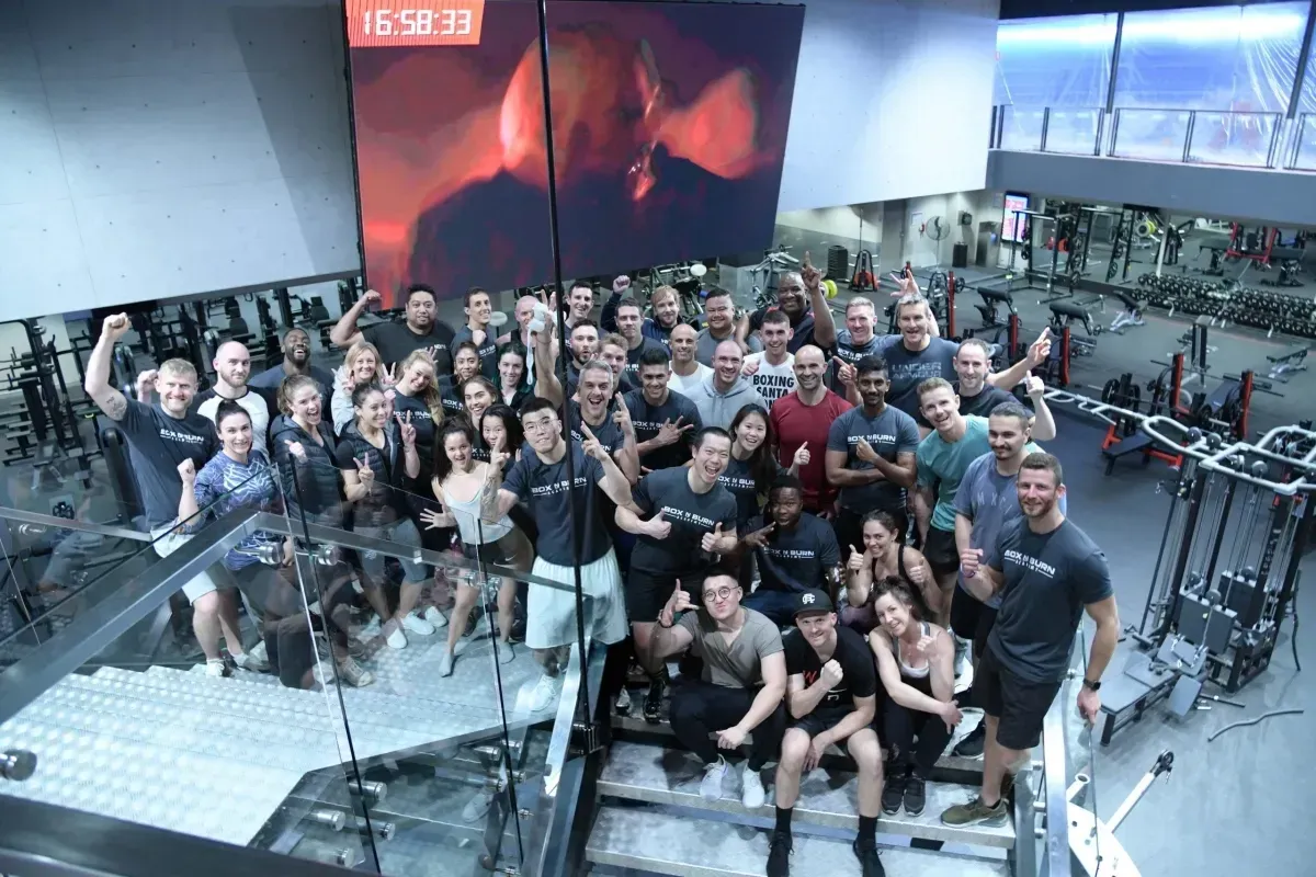 Group of young personal trainers attending an in person boxing for fitness certification course in Washington, DC taught by Tony Jeffries.