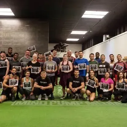 Group of male and female personal trainers attending an in person boxing for fitness certification course in San Jose taught by Tony Jeffries.
