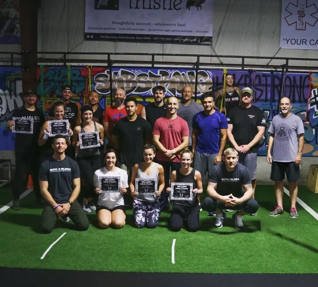 Group of certified Level 1 trainers attending an in person boxing for fitness certification live course taught by Tony Jeffries.
