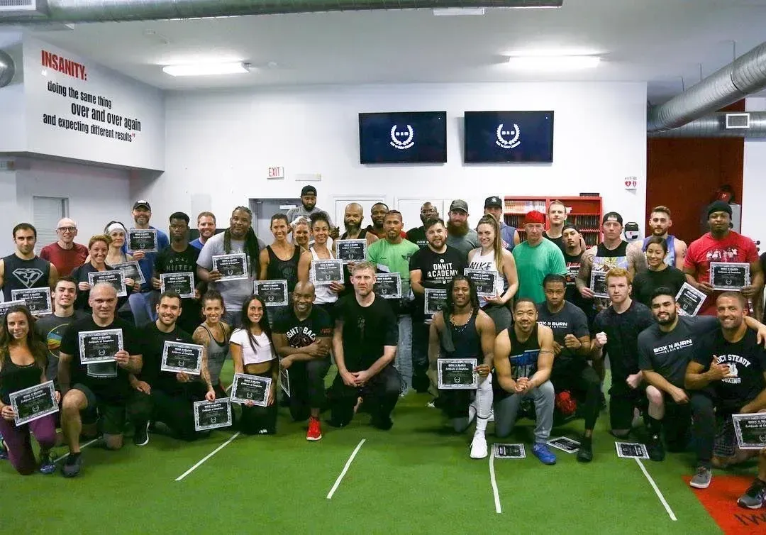 Group photo of personal trainers attending an in person boxing for fitness certification course in Austin, Texas taught by Tony Jeffries.