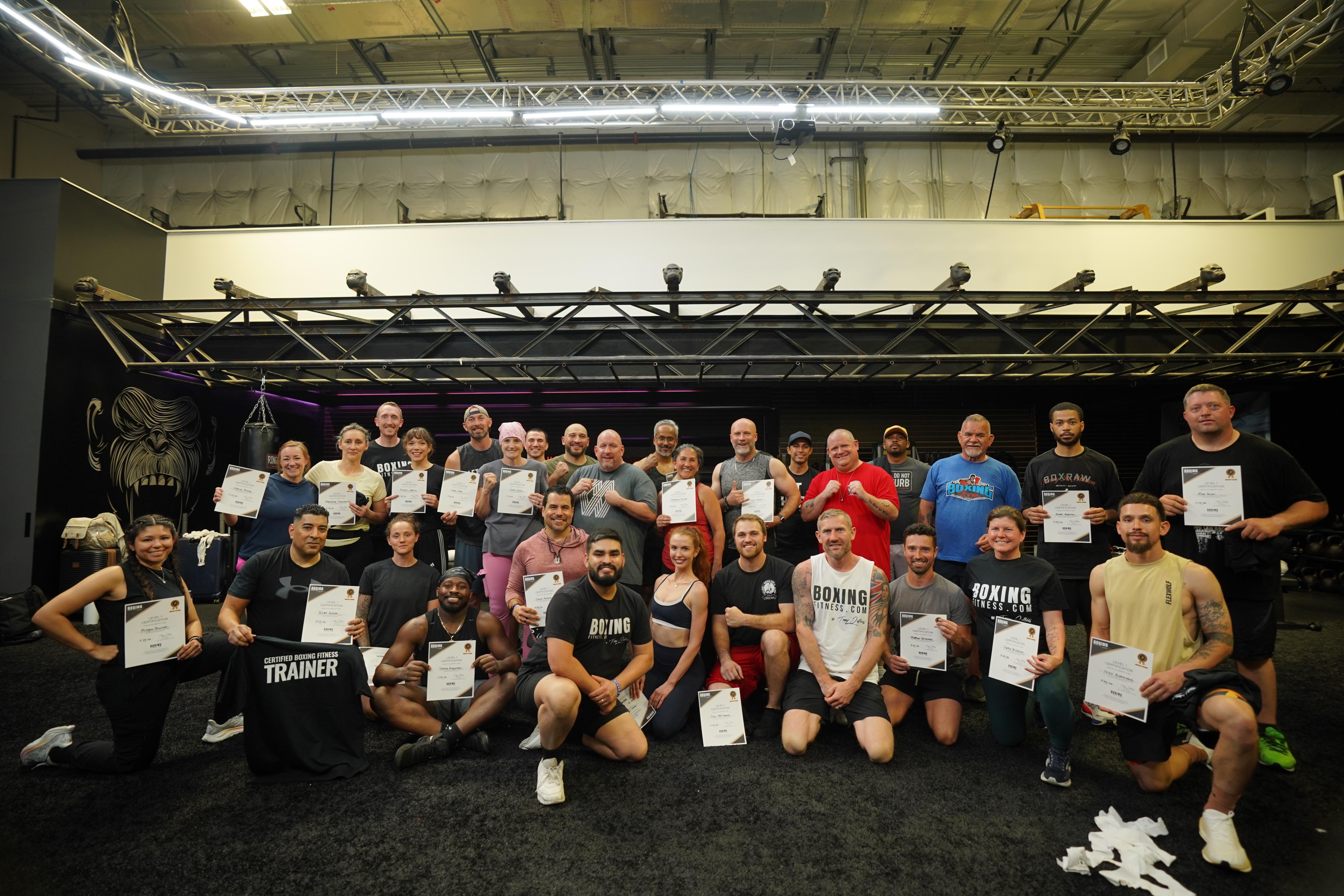 Group photo of personal trainers attending an in person boxing for fitness certification course in Austin, Texas taught by Tony Jeffries.