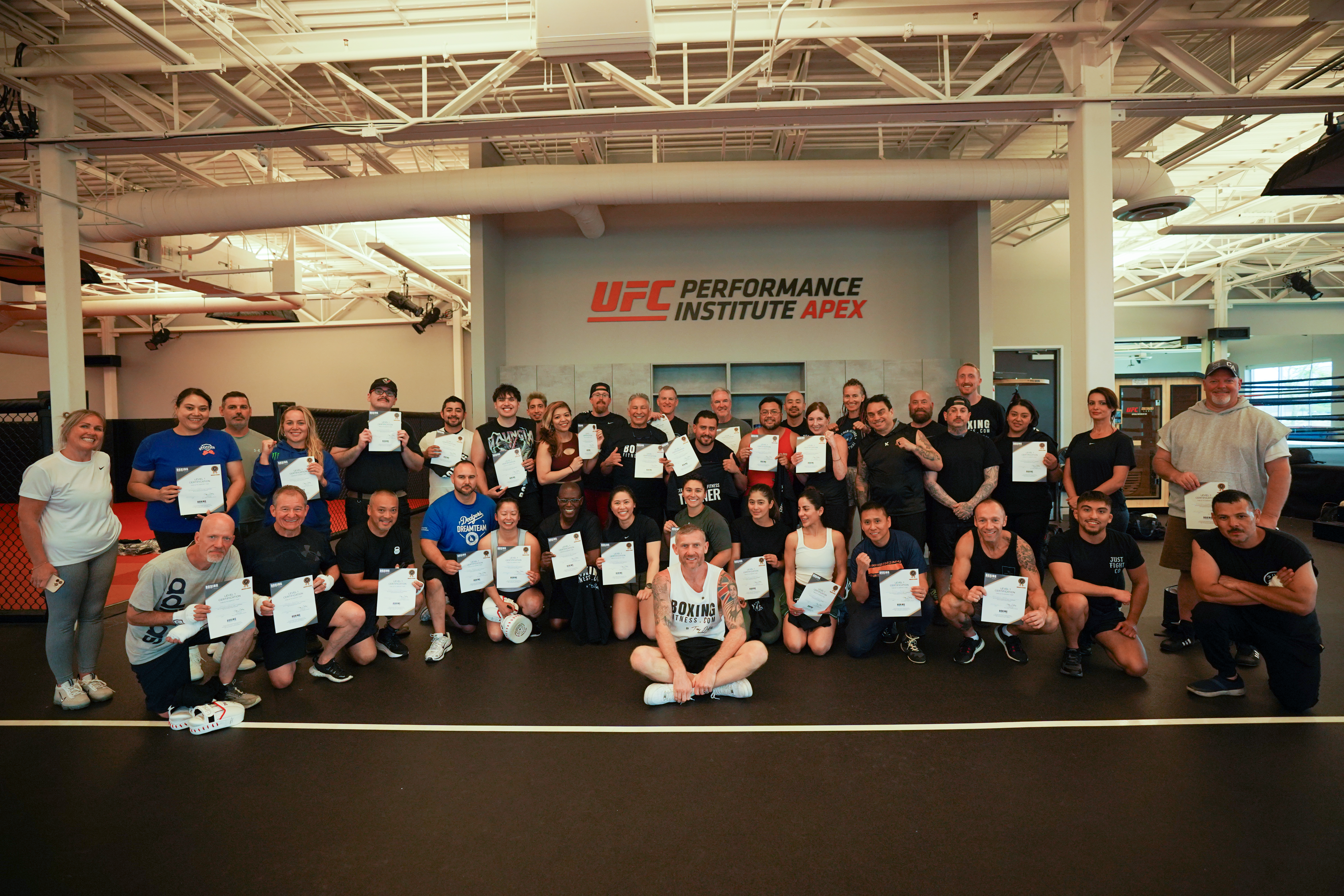 Group photo of personal trainers attending an in person boxing for fitness certification course in Austin, Texas taught by Tony Jeffries.