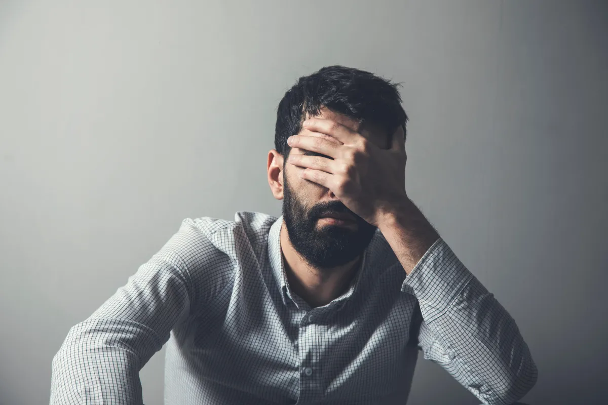 flowers in front of body of water