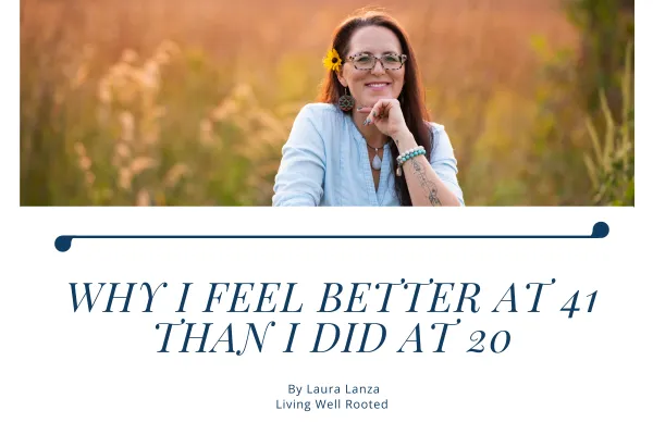 Laura Lanza of Living Well Rooted smiling outdoors in a golden field, featured in blog post about feeling better at 41 than in her 20s