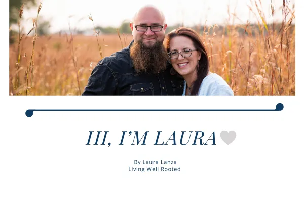 Laura Lanza with husband Joe on their Northern Illinois homestead, founder of Living Well Rooted, promoting simple living and natural wellness.