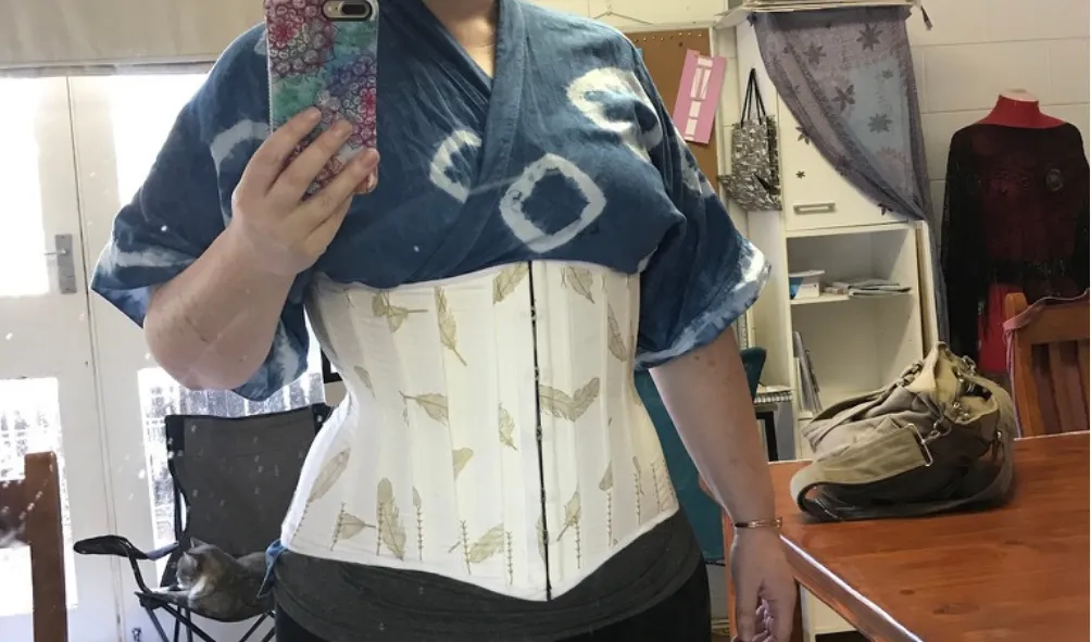 Andi wearing a custom fitted corset