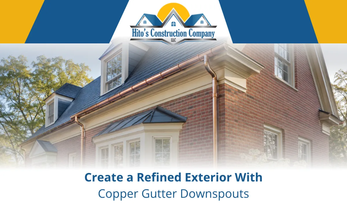 Copper gutter downspouts installed along a home exterior