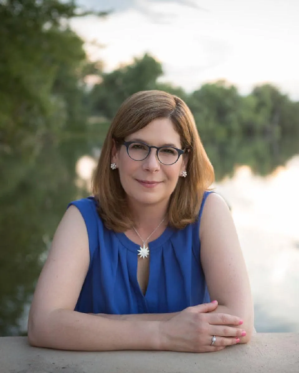 Joya in natural light, smiling, dappled light