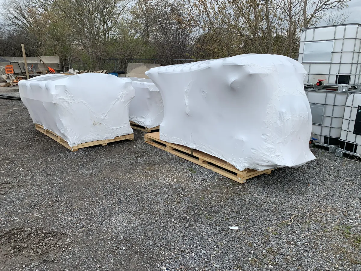 UV-stable shrink film protecting machinery in a snow-covered Ontario yard