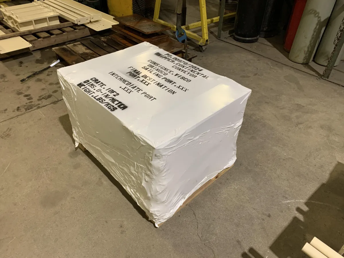 Industrial equipment shrink wrapped for shipping across Eastern Ontario
