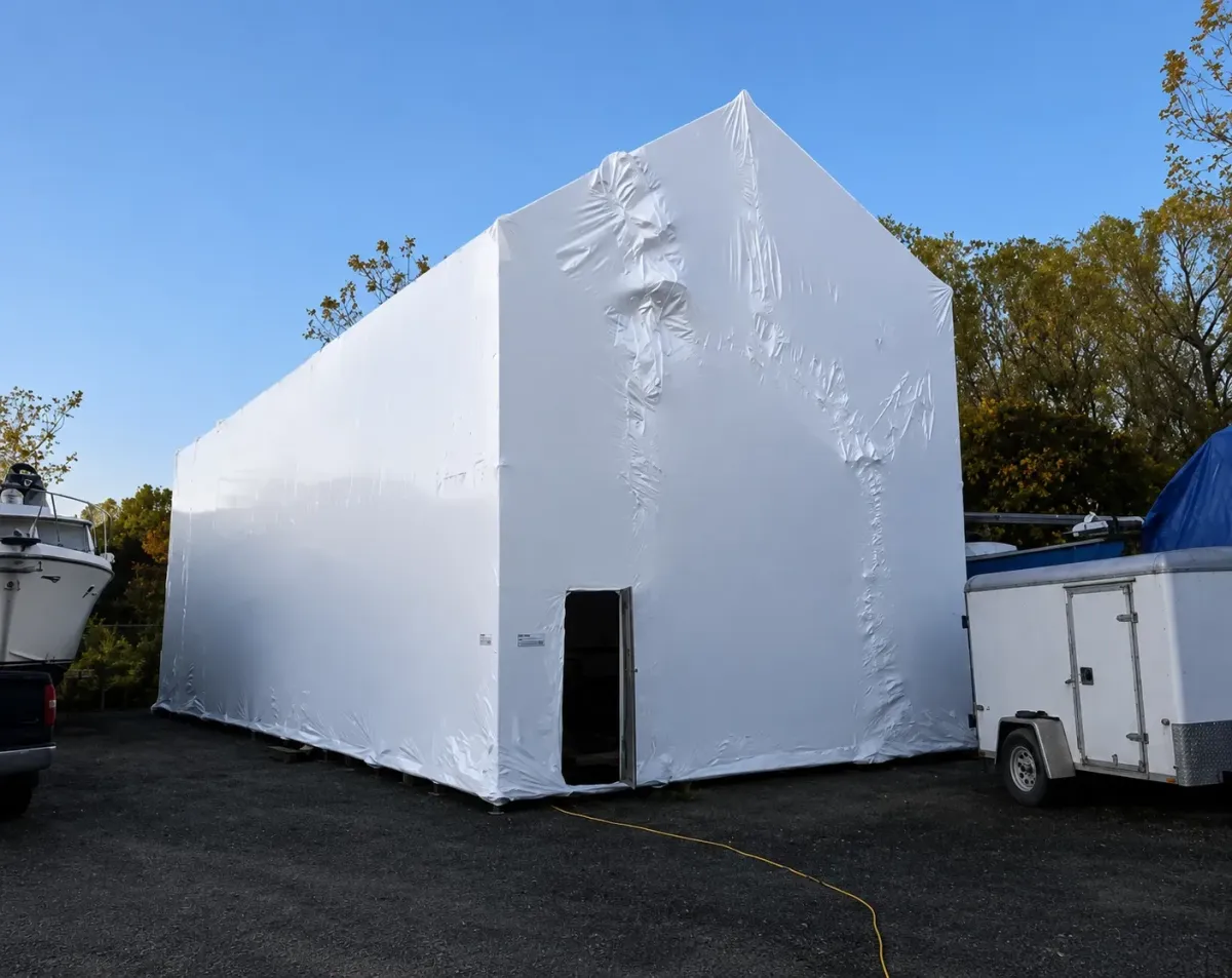 Scaffolding shrink wrap enclosure on an active construction site in Ontario