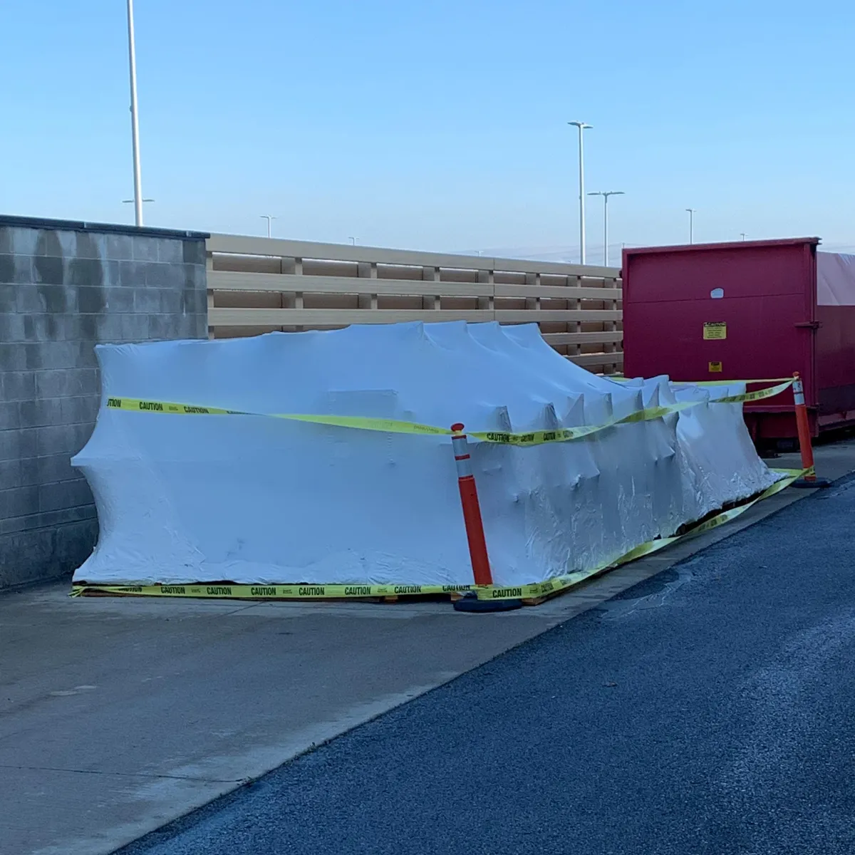 Industrial equipment shrink wrapped for long-term outdoor yard storage