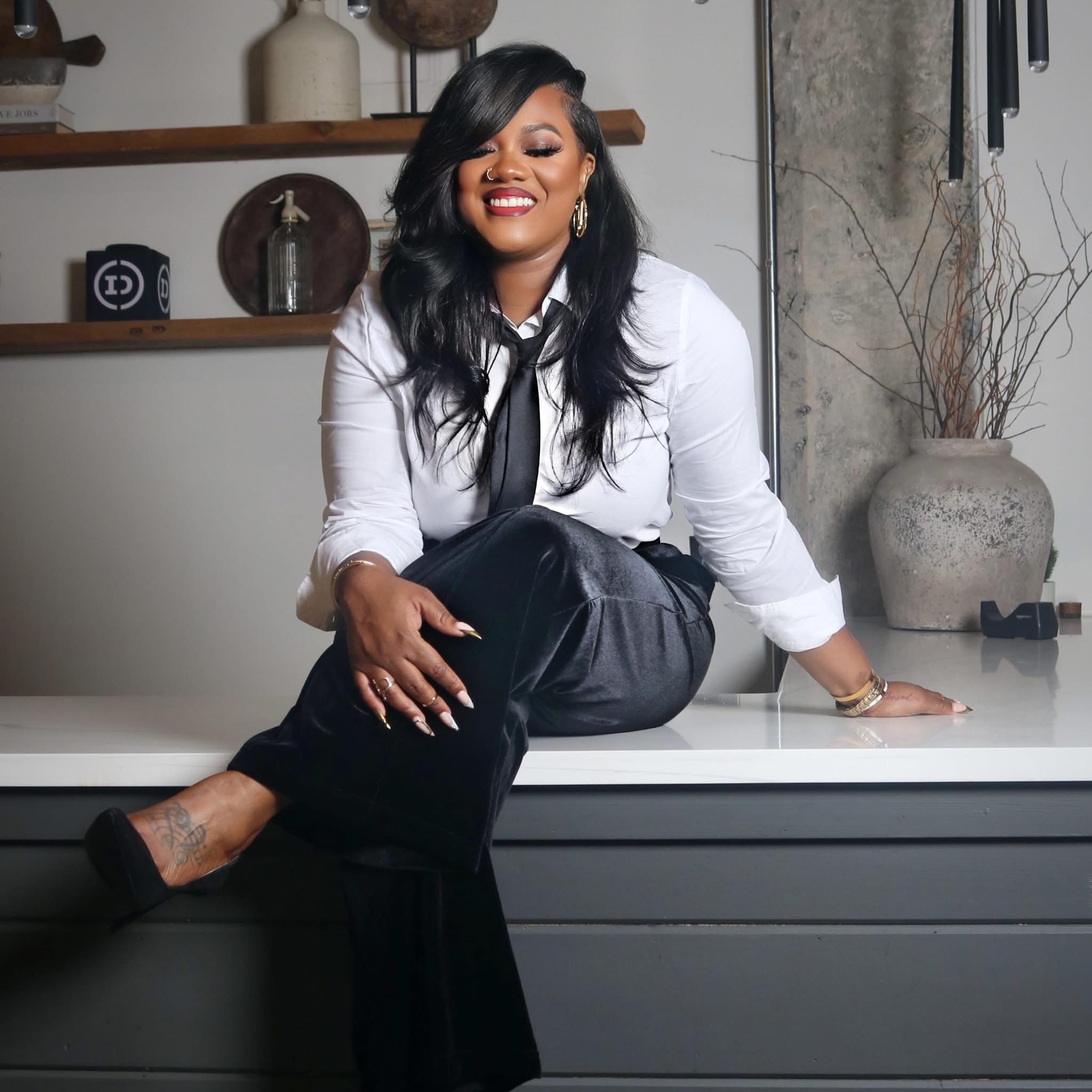 Woman quietly journaling and reflecting about her finances