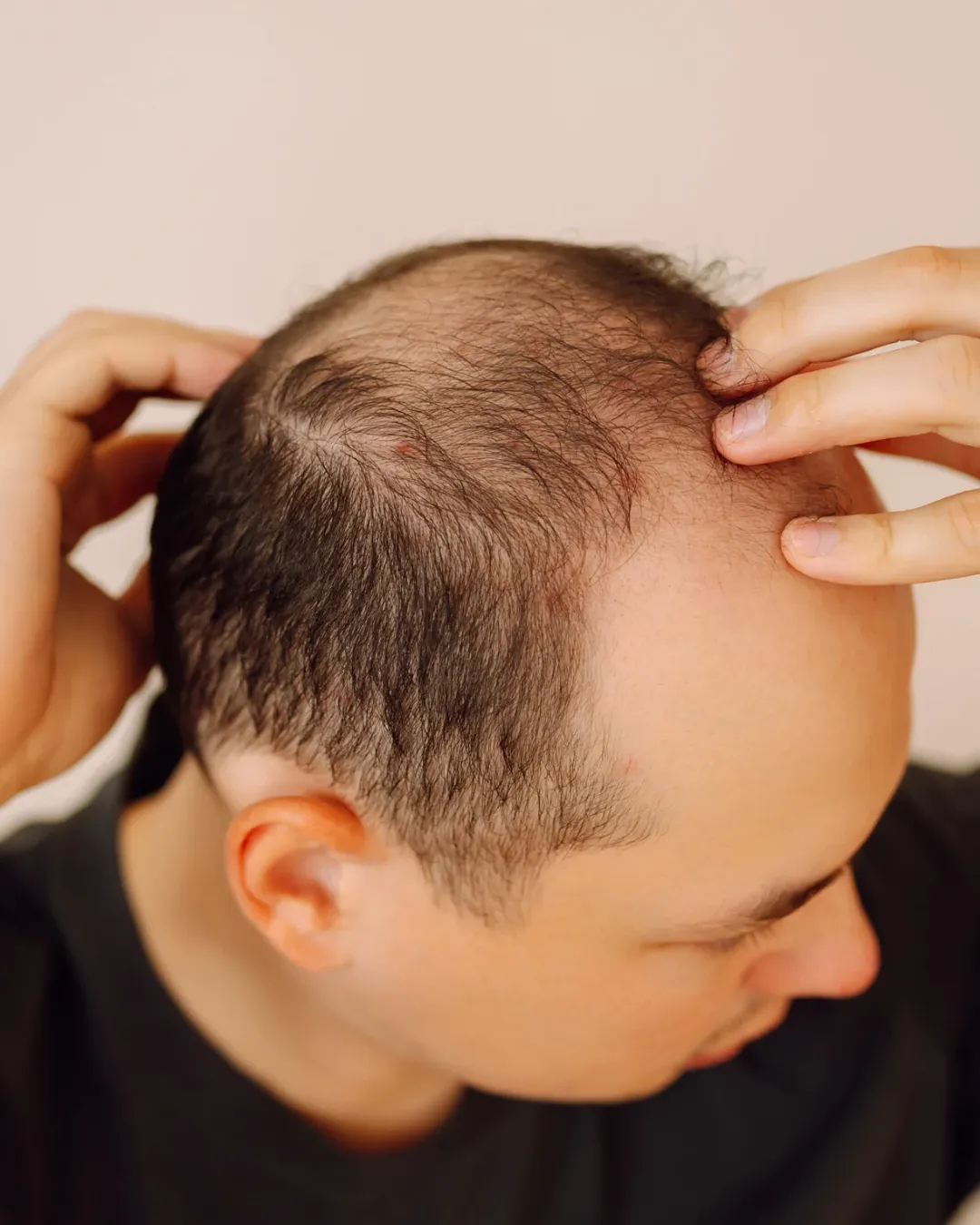 brown brick building with green plants