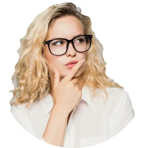 Thoughtful blonde woman wearing glasses and a white shirt.